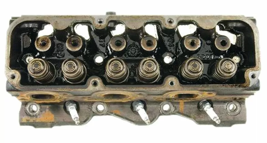 Cylinder head pre-cleanup - sludge around the valve springs and push rod openings